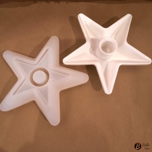 Stampo in silicone per la realizzazione di un portacandela a forma di stella e gesso di esempio