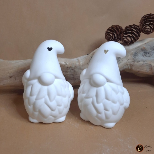 Due gnomi in gesso Paffuto uno con cuoricino nero e uno oro