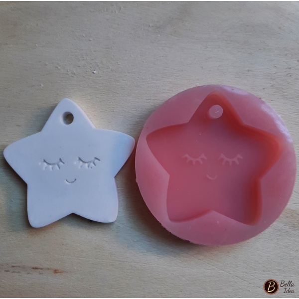 Stampo  in silicone stellina con sorriso con gesso di esempio